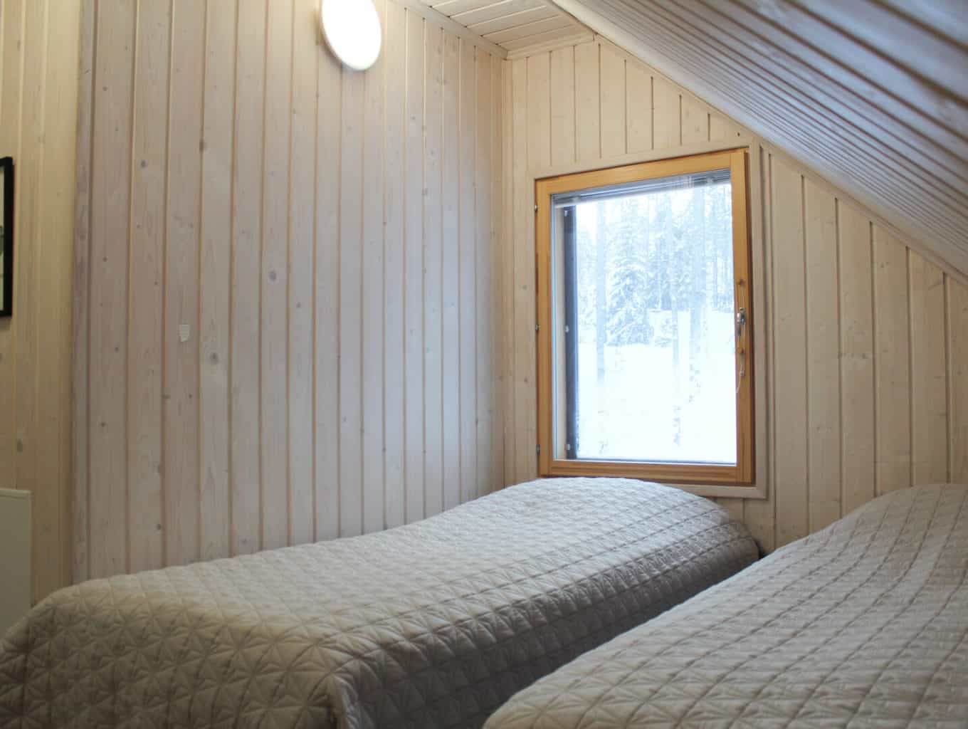 Вилла Hiekkaranta поднимает спальню с 2 односпальными кроватями