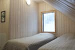 Vila Hiekkaranta viršutiniame aukšte miegamasis kambarys 2 viengulės lovos